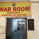 A banner hangs outside the war room.